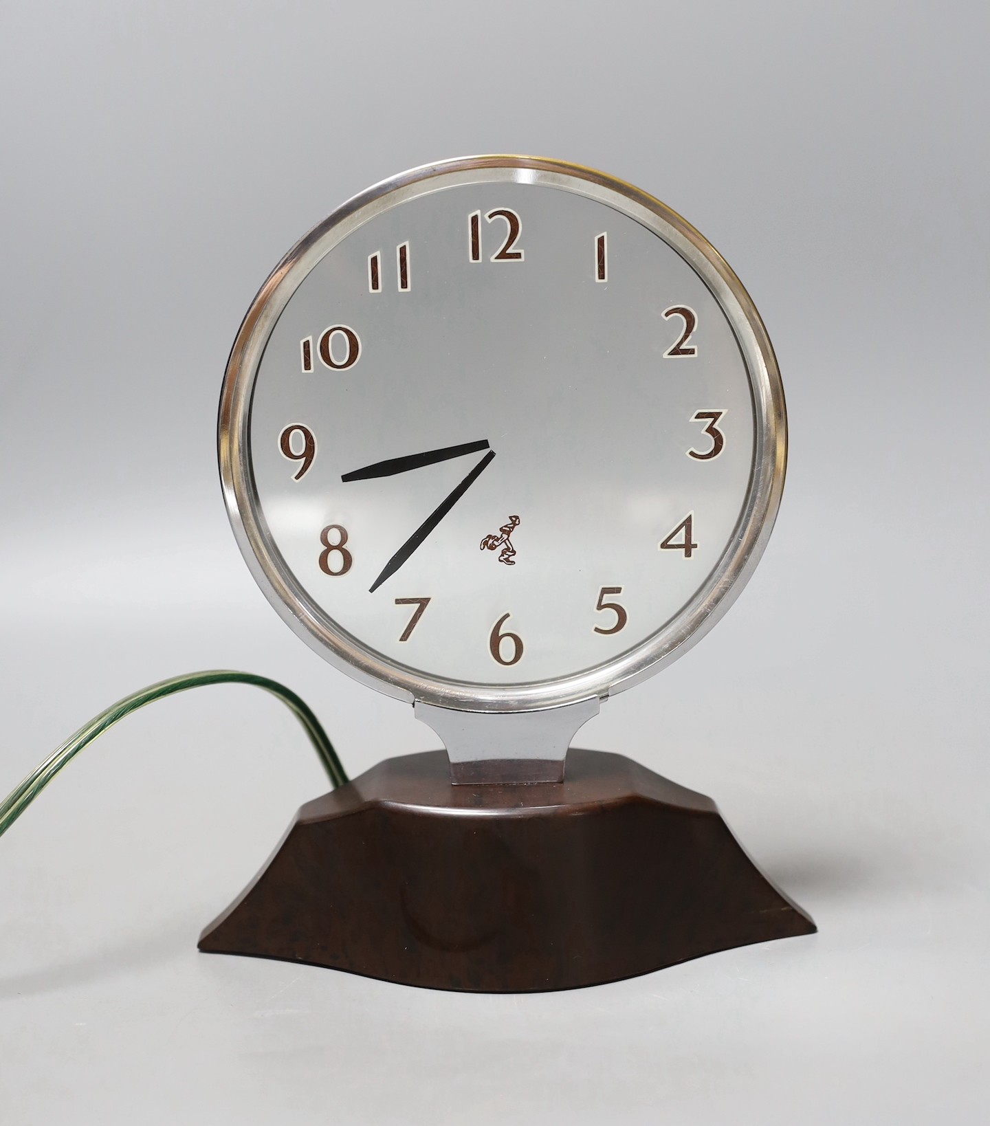 A Rex Cole vintage ‘Boots Boy’ chrome and Bakelite clock - 19cm tall